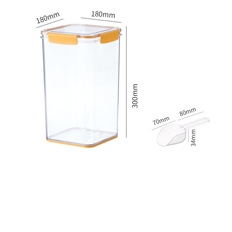 Transparent plastic storage container with orange lid clips and measuring scoop on white background