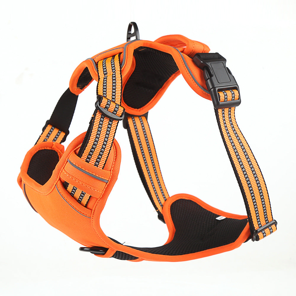 Adjustable orange and black padded dog harness with reflective striped straps and plastic buckle