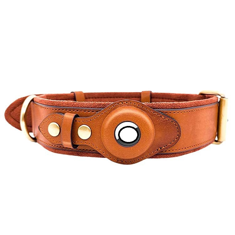 Brown leather dog collar with brass buckle and round central detail on white background