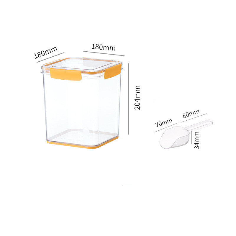 Clear square food storage container with orange locking lid and matching base, and a white measuring scoop with dimensions