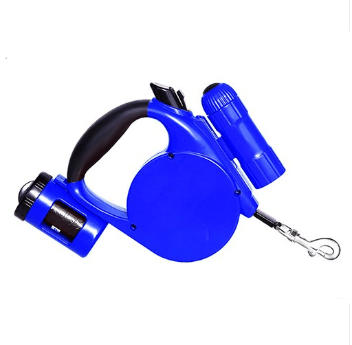 Blue retractable dog leash with a black handle, built-in waste bag dispenser, and flashlight