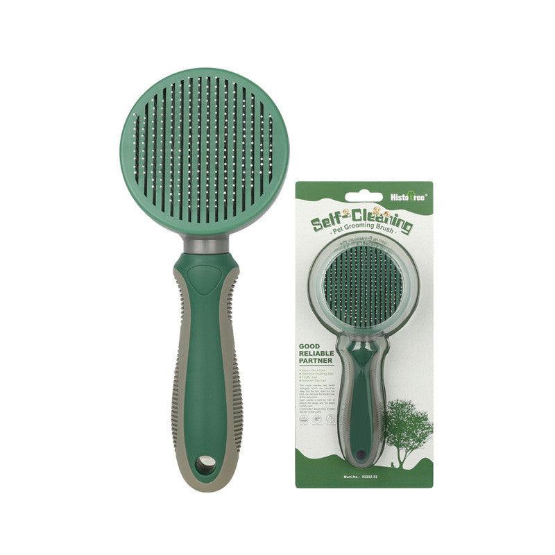 Green self-cleaning pet grooming brush with plastic bristles and ergonomic handle